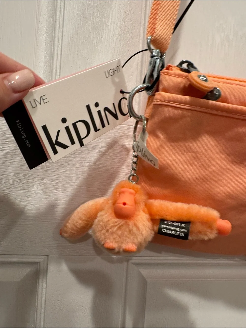 Kipling Peach Orange Crossbody Bag with Plush Monkey Charm